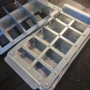 Disposable foil tray cutter into 10 12.5" x 7.5" x 2"